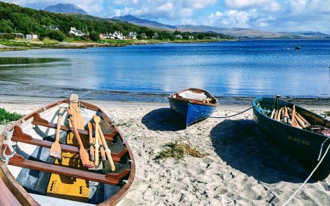 Rowing boats on the beach in readiness for Jura Regatta